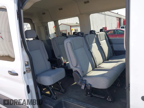2015 Ford Transit Passenger XL z VIN 1FBAX2CG7FKA75719, wystawiony jako IAAI lot #42135118 z przebiegiem Nie podano mil oraz . Historia ofert i sprzedaży dostępna na DreamBid. Obrazek 8.
