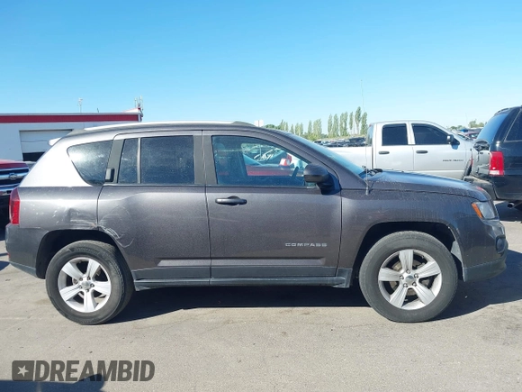2016 Jeep Compass High Altitude with VIN 1C4NJDEB1GD758355, listed as a IAAI auction lot 42785665 with 76,742 mi miles and . Bid and sale history available at DreamBid. Image 13.