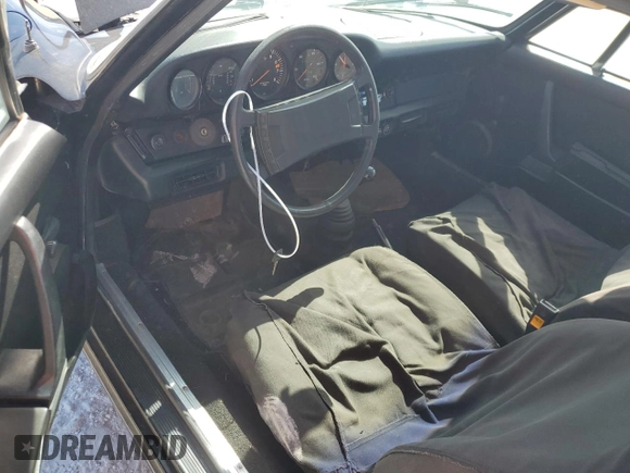 1975 Porsche 911 with VIN 9115202267, listed as a Copart auction lot 75863884 with 61,298 mi miles and Salvage title. Bid and sale history available at DreamBid. Image 8.