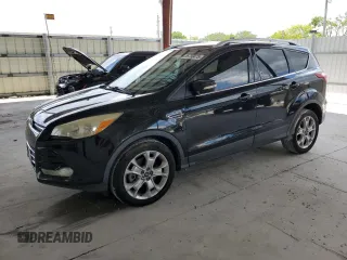 2015 Ford Escape Titanium z VIN 1FMCU0J98FUA20296, wystawiony jako Copart lot #56750475 z przebiegiem 186 200 mil mil oraz Czysty tytuł • Clean title. Historia ofert i sprzedaży dostępna na DreamBid. Obrazek 1.