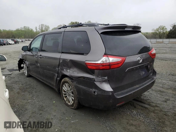 2015 Toyota Sienna XLE with VIN 5TDYK3DC6FS660035, listed as a Copart auction lot 51660075 with 176,968 mi miles and Salvage Title. Bid and sale history available at DreamBid. Image 2.