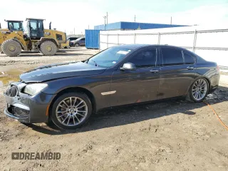 2015 BMW 7 Series 740i with VIN WBAYA6C59FD827018, listed as a Copart auction lot 82303774 with 194,301 mi miles and Clean Title. Bid and sale history available at carsss.com. Image 1.