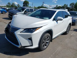 2018 Lexus RX 350L Premium z VIN JTJDZKCAXJ2006088, wystawiony jako IAAI lot #42332914 z przebiegiem 104 393 mil mil oraz . Historia ofert i sprzedaży dostępna na DreamBid. Obrazek 2.