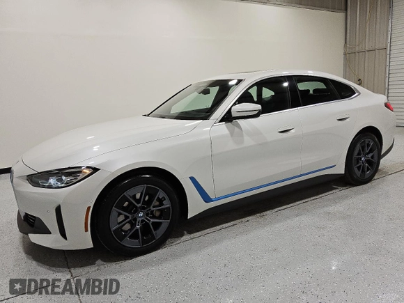 2024 BMW i4 eDrive40 z VIN WBY73AW04RFT37296, wystawiony jako Copart lot #55534975 z przebiegiem 18 786 mil mil oraz Czysty tytuł • Clean title. Historia ofert i sprzedaży dostępna na DreamBid. Obrazek 1.