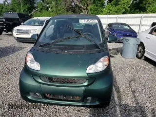 2009 Smart fortwo Passion z VIN WMEEK31X89K289001, wystawiony jako Copart lot #51781925 z przebiegiem 79 742 mil mil oraz Szkoda całkowita • Salvage title. Historia ofert i sprzedaży dostępna na DreamBid. Obrazek 11.