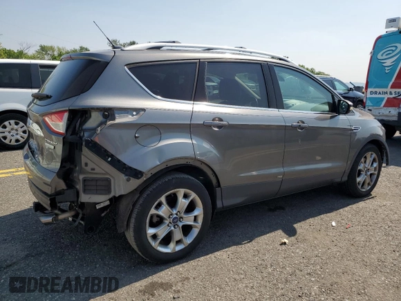 2014 Ford Escape Titanium с VIN 1FMCU0J96EUD41199, выставлен на аукционе Copart как лот 59380245 с пробегом 100 319 миль миль и Списание • Salvage title. История ставок и продаж доступна на DreamBid. Изображение 3.
