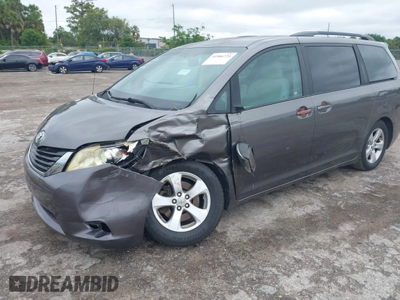 2014 Toyota Sienna LE AAS with VIN 5TDKK3DC9ES448461, listed as a IAAI auction lot 41986724 with 102,930 mi miles and . Bid and sale history available at carsss.com. Image 21.