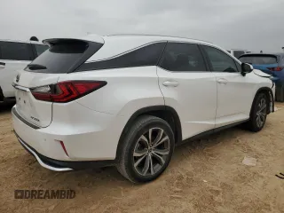 2021 Lexus RX with VIN JTJHZKEA2M2020568, listed as a Copart auction lot 51329565 with 51,961 mi miles and Salvage Title. Bid and sale history available at carsss.com. Image 3.