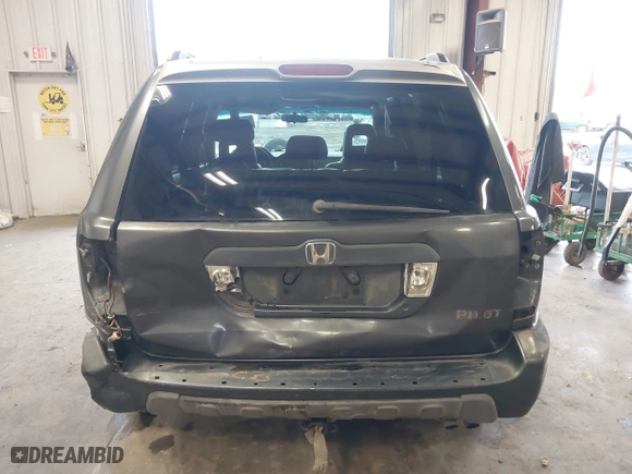 2005 Honda Pilot EX-L with RES with VIN 2HKYF18655H521175, listed as a IAAI auction lot 41490812 with 357,033 mi miles. Bid and sale history available at carsss.com. Image 17.