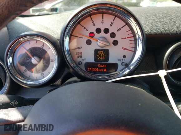 2013 MINI Convertible S с VIN WMWZP3C50DT297607, выставлен на аукционе Copart как лот 50459635 с пробегом 171 004 миль миль и Чистый • Clean title. История ставок и продаж доступна на DreamBid. Изображение 9.