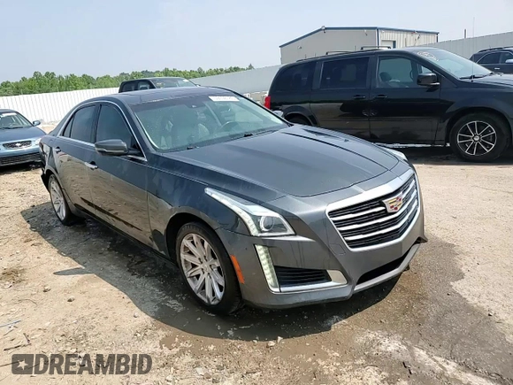2015 Cadillac CTS Luxury RWD z VIN 1G6AR5SX2F0118726, wystawiony jako Copart lot #59198185 z przebiegiem 106 604 mil mil oraz Szkoda całkowita • Salvage title. Historia ofert i sprzedaży dostępna na DreamBid. Obrazek 13.