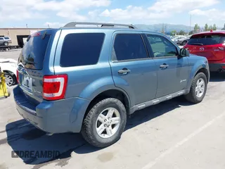 2011 Ford Escape Hybrid with VIN 1FMCU4K30BKC54584, listed as a IAAI auction lot 42131257 with 107,905 mi miles and . Bid and sale history available at DreamBid. Image 4.