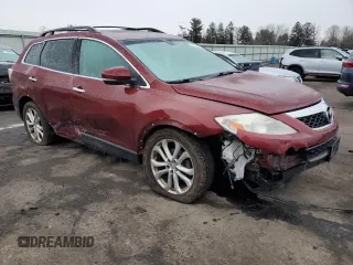 2012 Mazda CX-9 Grand Touring with VIN JM3TB3DV3C0355092, listed as a Copart auction lot 44688125 with 150,381 mi miles and Salvage Title. Bid and sale history available at carsss.com. Image 4.