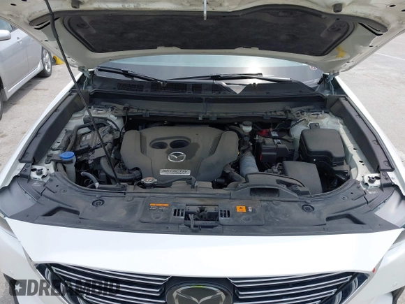 2019 Mazda CX-9 Touring with VIN JM3TCACY1K0334804, listed as a IAAI auction lot 42411662 with 49,447 mi miles and . Bid and sale history available at DreamBid. Image 10.