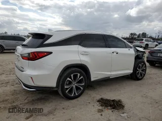 2018 Lexus RX with VIN JTJDGKCA4J2003743, listed as a Copart auction lot 43180945 with 82,556 mi miles and Salvage Title. Bid and sale history available at carsss.com. Image 3.