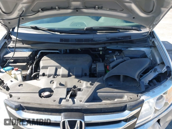 2014 Honda Odyssey EX-L with VIN 5FNRL5H63EB041106, listed as a IAAI auction lot 42294113 with 122,610 mi miles and . Bid and sale history available at DreamBid. Image 10.