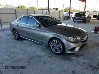 2019 Mercedes-Benz C 300 with VIN WDDWF8DB2KR502810, listed as a Copart auction lot 60519765 with 56,972 mi miles and Salvage title. Bid and sale history available at DreamBid. Image 4.