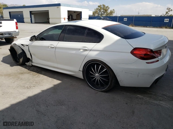 2015 BMW 6 Series 640i with VIN WBA6A0C59FGB53555, listed as a Copart auction lot 67128254 with 99,503 mi miles and Salvage Title. Bid and sale history available at carsss.com. Image 2.