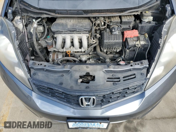 2013 Honda Fit Sport with VIN JHMGE8H52DC046740, listed as a Copart auction lot 48940075 with 116,450 mi miles and Salvage Title. Bid and sale history available at carsss.com. Image 11.
