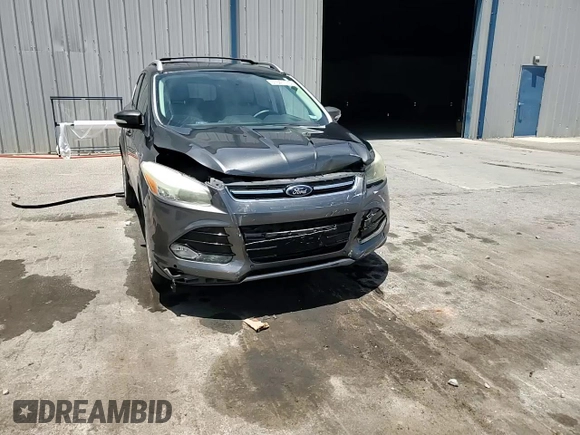 2015 Ford Escape Titanium z VIN 1FMCU0J98FUB06577, wystawiony jako Copart lot #61341175 z przebiegiem 66 206 mil mil oraz Szkoda całkowita • Salvage title. Historia ofert i sprzedaży dostępna na DreamBid. Obrazek 14.
