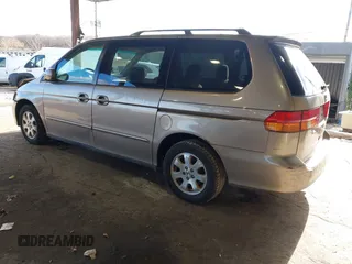 2004 Honda Odyssey EX-RES z VIN 5FNRL18874B127785, wystawiony jako IAAI lot #41141221 z przebiegiem 151 036 mil mil oraz . Historia ofert i sprzedaży dostępna na DreamBid. Obrazek 3.