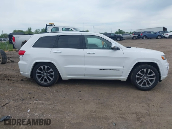 2017 Jeep Grand Cherokee Overland with VIN 1C4RJFCG6HC941771, listed as a IAAI auction lot 42356577 with 192,318 mi miles and . Bid and sale history available at DreamBid. Image 13.
