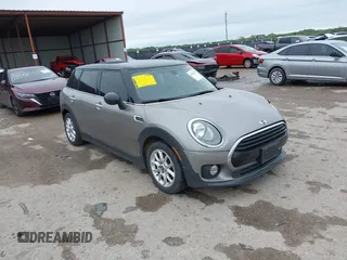 2017 MINI Clubman Cooper z VIN WMWLN5C53H2E32472, wystawiony jako IAAI lot #41901247 z przebiegiem 85 563 mil mil oraz . Historia ofert i sprzedaży dostępna na DreamBid. Obrazek 1.
