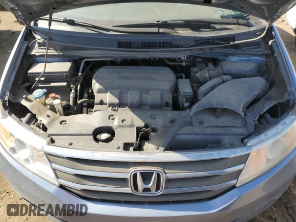 2013 Honda Odyssey EX z VIN 5FNRL5H43DB062745, wystawiony jako Copart lot #48347945 z przebiegiem 70 136 mil mil oraz Szkody całkowita. Historia ofert i sprzedaży dostępna na DreamBid. Obrazek 12.