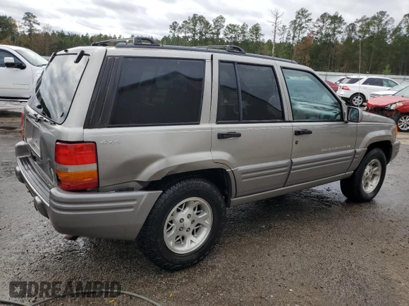 1997 Jeep Grand Cherokee Limited with VIN 1J4GZ78Y0VC682949, listed as a Copart auction lot 82152424 with 194,576 mi miles and Salvage Title. Bid and sale history available at carsss.com. Image 3.