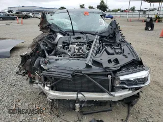 2019 BMW 5 Series M550i xDrive with VIN WBAJB9C53KB464298, listed as a Copart auction lot 59892105 with Not provided miles and Salvage title. Bid and sale history available at DreamBid. Image 5.