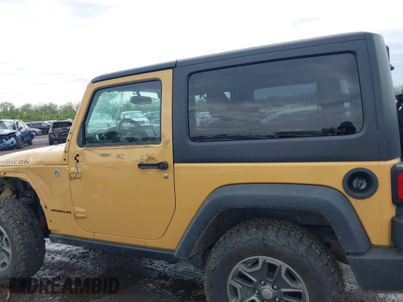 2014 Jeep Wrangler Rubicon with VIN 1C4BJWCG4EL145081, listed as a IAAI auction lot 42180723 with 113,659 mi miles and . Bid and sale history available at DreamBid. Image 14.