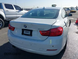 2015 BMW 4 Series 428i with VIN WBA3N7C54FK225367, listed as a IAAI auction lot 41958685 with 142,104 mi miles. Bid and sale history available at carsss.com. Image 16.