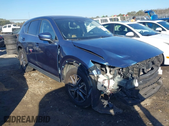 2018 Mazda CX-5 Grand Touring with VIN JM3KFADM9J1328501, listed as a IAAI auction lot 41408154 with 116,679 mi miles. Bid and sale history available at carsss.com. Image 1.