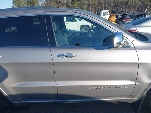 2014 Jeep Grand Cherokee Overland with VIN 1C4RJFCGXEC162238, listed as a IAAI auction lot 41291512 with 88,261 mi miles. Bid and sale history available at carsss.com. Image 13.