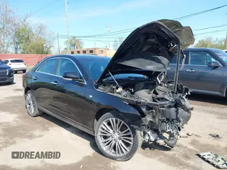 2021 Cadillac CT4 Premium Luxury z VIN 1G6DF5RK8M0121711, wystawiony jako IAAI lot #42197628 z przebiegiem Nie podano mil oraz . Historia ofert i sprzedaży dostępna na DreamBid. Obrazek 1.
