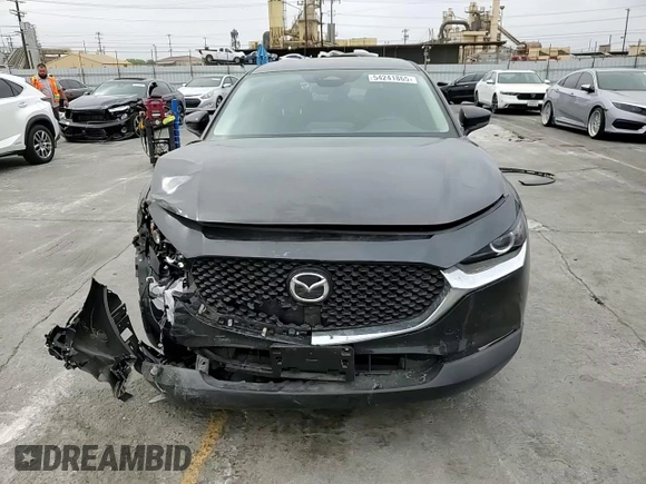 2025 Mazda CX-30 S with VIN 3MVDMBAMXSM778811, listed as a Copart auction lot 54241865 with 8,822 mi miles and Salvage title. Bid and sale history available at DreamBid. Image 15.
