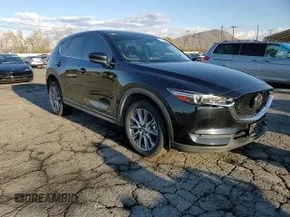 2020 Mazda CX-5 Grand Touring with VIN JM3KFADM0L0786565, listed as a Copart auction lot 48430915 with 60,390 mi miles and Salvage Title. Bid and sale history available at carsss.com. Image 12.