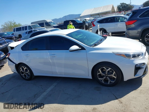2021 Kia Forte LXS z VIN 3KPF24AD3ME283990, wystawiony jako IAAI lot #41839394 z przebiegiem 66 197 mil mil oraz . Historia ofert i sprzedaży dostępna na DreamBid. Obrazek 13.