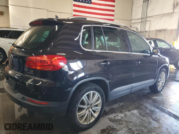 2013 Volkswagen Tiguan SE z VIN WVGBV7AX9DW529234, wystawiony jako Copart lot #41610635 z przebiegiem 130 566 mil mil oraz Szkoda całkowita • Salvage title. Historia ofert i sprzedaży dostępna na DreamBid. Obrazek 3.