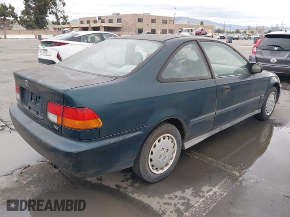 1997 Honda Civic DX with VIN 1HGEJ6128VL023684, listed as a IAAI auction lot 41502999 with 140,871 mi miles. Bid and sale history available at carsss.com. Image 4.