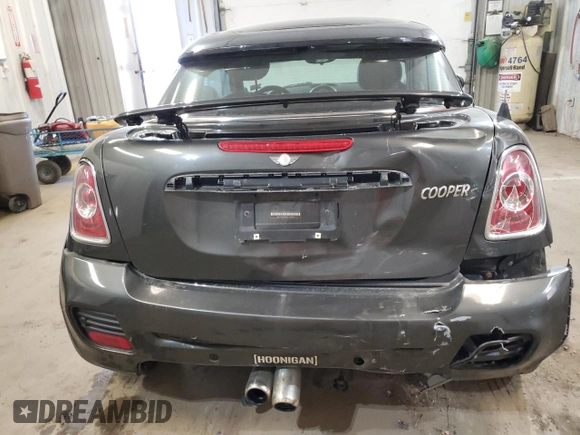 2012 MINI Coupe S z VIN WMWSX3C50CT154835, wystawiony jako Copart lot #76659984 z przebiegiem 122 425 mil mil oraz Szkoda całkowita • Salvage title. Historia ofert i sprzedaży dostępna na DreamBid. Obrazek 6.