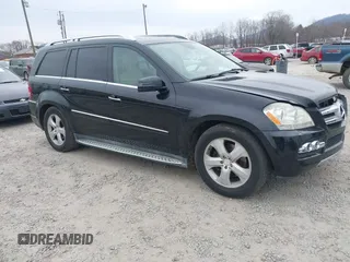 2011 Mercedes-Benz GL-Class GL 450 with VIN 4JGBF7BE9BA649538, listed as a IAAI auction lot 41789876 with 164,423 mi miles. Bid and sale history available at carsss.com. Image 1.
