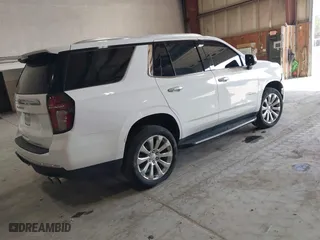 2023 Chevrolet Tahoe Premier with VIN 1GNSKSKD0PR217513, listed as a IAAI auction lot 41779222 with 55,424 mi miles. Bid and sale history available at carsss.com. Image 4.