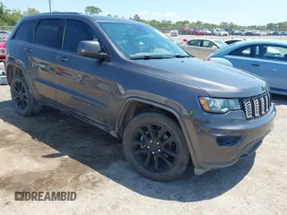 2020 Jeep Grand Cherokee Altitude with VIN 1C4RJEAG3LC429536, listed as a IAAI auction lot 42024168 with 59,979 mi miles and . Bid and sale history available at DreamBid. Image 1.