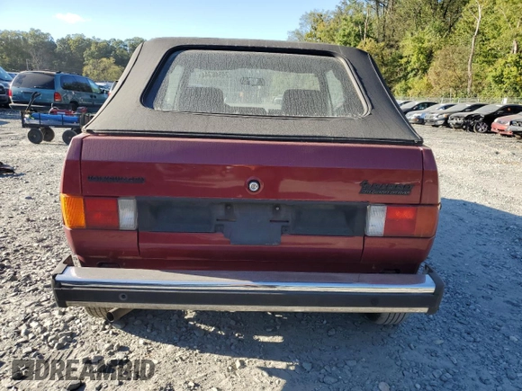 1982 Volkswagen Rabbit z VIN WVWCA0153CK006047, wystawiony jako Copart lot #74948744 z przebiegiem 127 659 mil mil oraz Szkoda całkowita • Salvage title. Historia ofert i sprzedaży dostępna na DreamBid. Obrazek 6.