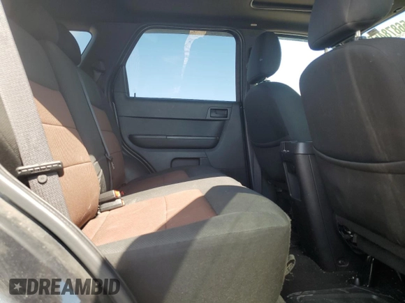 2008 Ford Escape XLT with VIN 1FMCU03198KA67732, listed as a Copart auction lot 56878455 with 105,619 mi miles and Salvage title. Bid and sale history available at DreamBid. Image 11.