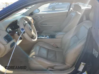 2008 Jaguar XK with VIN SAJWA43C589B23096, listed as a Copart auction lot 79337334 with 143,902 mi miles and Salvage Title. Bid and sale history available at carsss.com. Image 7.