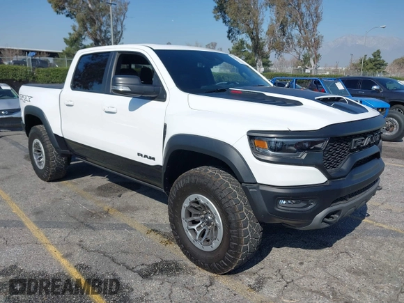 2022 Ram 1500 TRX with VIN 1C6SRFU93NN172647, listed as a IAAI auction lot 41539123 with 18,016 mi miles and . Bid and sale history available at DreamBid. Image 1.