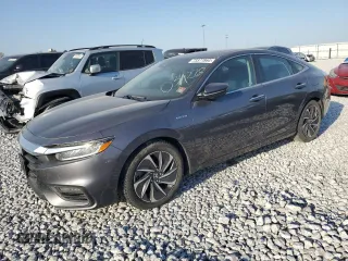 2019 Honda Insight Touring z VIN 19XZE4F94KE034278, wystawiony jako Copart lot #73377864 z przebiegiem Nie podano mil oraz Szkoda całkowita • Salvage title. Historia ofert i sprzedaży dostępna na DreamBid. Obrazek 1.
