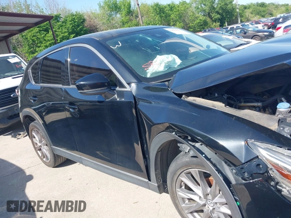 2019 Mazda CX-5 Grand Touring with VIN JM3KFBDM2K0564047, listed as a IAAI auction lot 42000455 with 152,590 mi miles and . Bid and sale history available at carsss.com. Image 13.